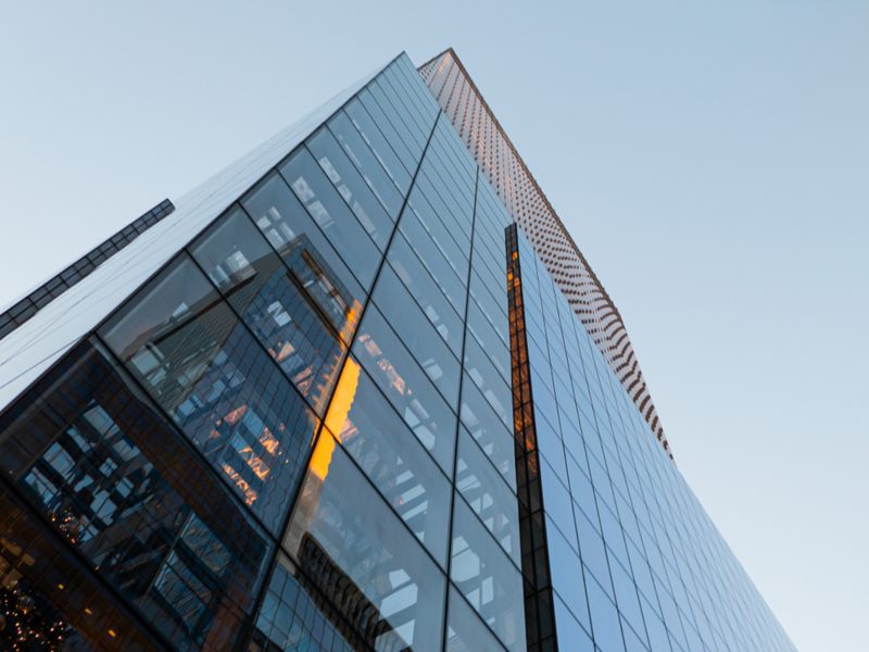 Glass facade of a modern commercial building